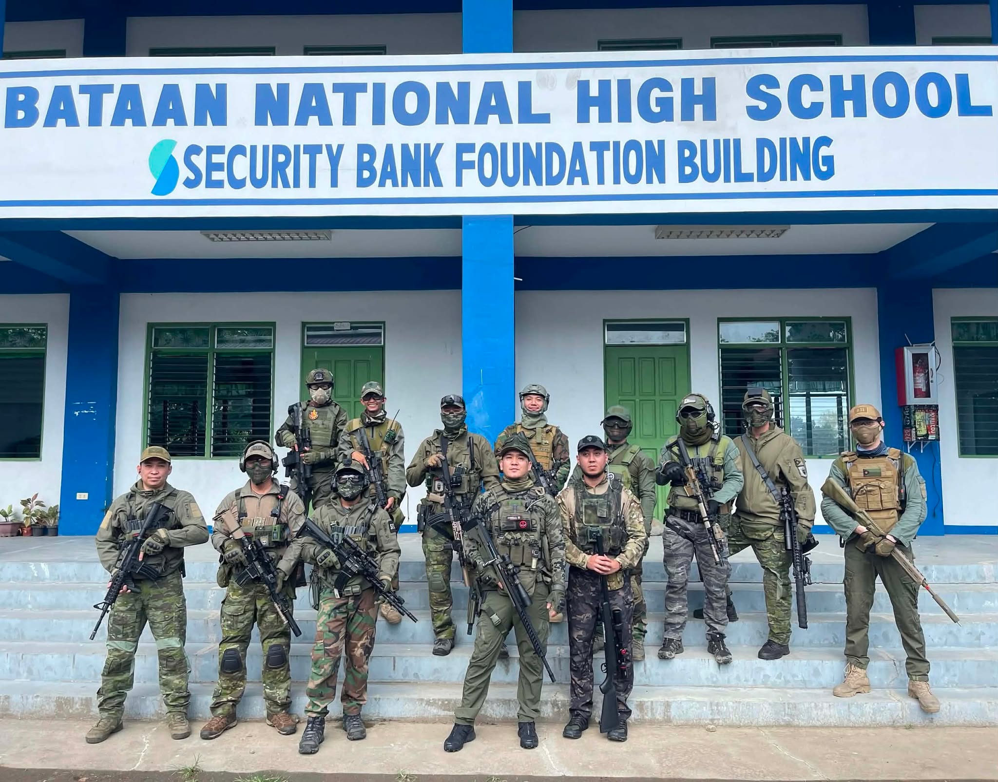 The team assembles outside Bataan National High School before a game.