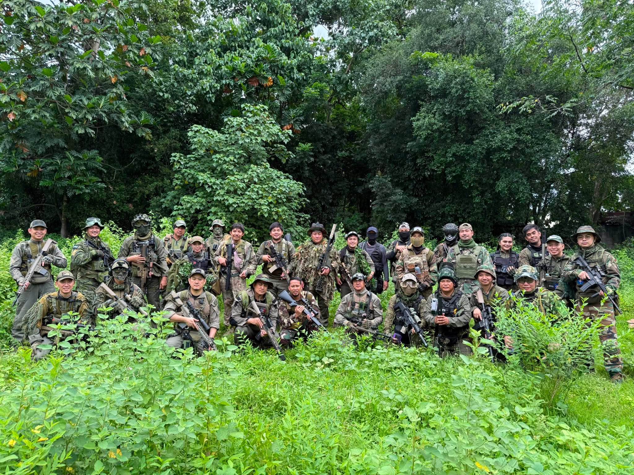 The team forms up in dense jungle terrain.
